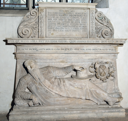 Wykonany w kamieniu pińczowskim pomnik nagrobny zmarłego
w 1580 roku rajcy i burmistrza Jana Mrowińskiego Płoczywłosa,
wystawiony jeszcze za jego życia, w 1577 roku, w krużganku klasztornym
kościoła św. Katarzyny w Krakowie