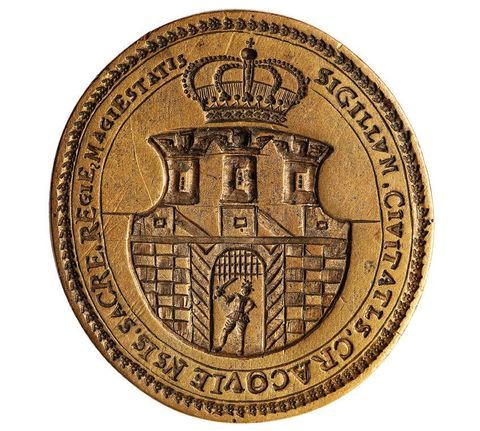 (014) Jedna z prób zmodernizowania herbu miasta, tutaj
poprzez umieszczenie w otwartej bramie muru miejskiego
postaci rycerza w zbroi; zachowany stempel (zwierciadlane
odbicie) pieczęci miejskiej pochodzący prawdopodobnie
sprzed 1661 r. Nie są znane dokumenty, które byłyby tą
pieczęcią opatrywane, być może wytworzono ją, ale nie
weszła do użycia (ANK, sygn. T 276)