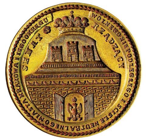 (017) Herb Krakowa i jednocześnie całej Rzeczypospolitej
Krakowskiej na datowanej na rok 1816 pieczęci głównej
Senatu Rządzącego, najwyższego organu wykonawczego
z prezesem Senatu na czele – tu zwierciadlane odbicie
stempla tej pieczęci (ANK, sygn. T 222)